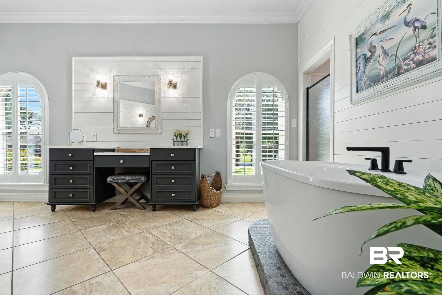 23357 Carnoustie Drive Foley, AL 36535 - Photo 57 of 99 Bathroom with a freestanding tub, vanity, tile patterned flooring, ornamental molding, and wood walls