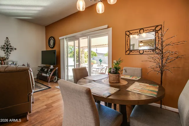 a en suite bathroom with a double vanity sink a mirror and a shower