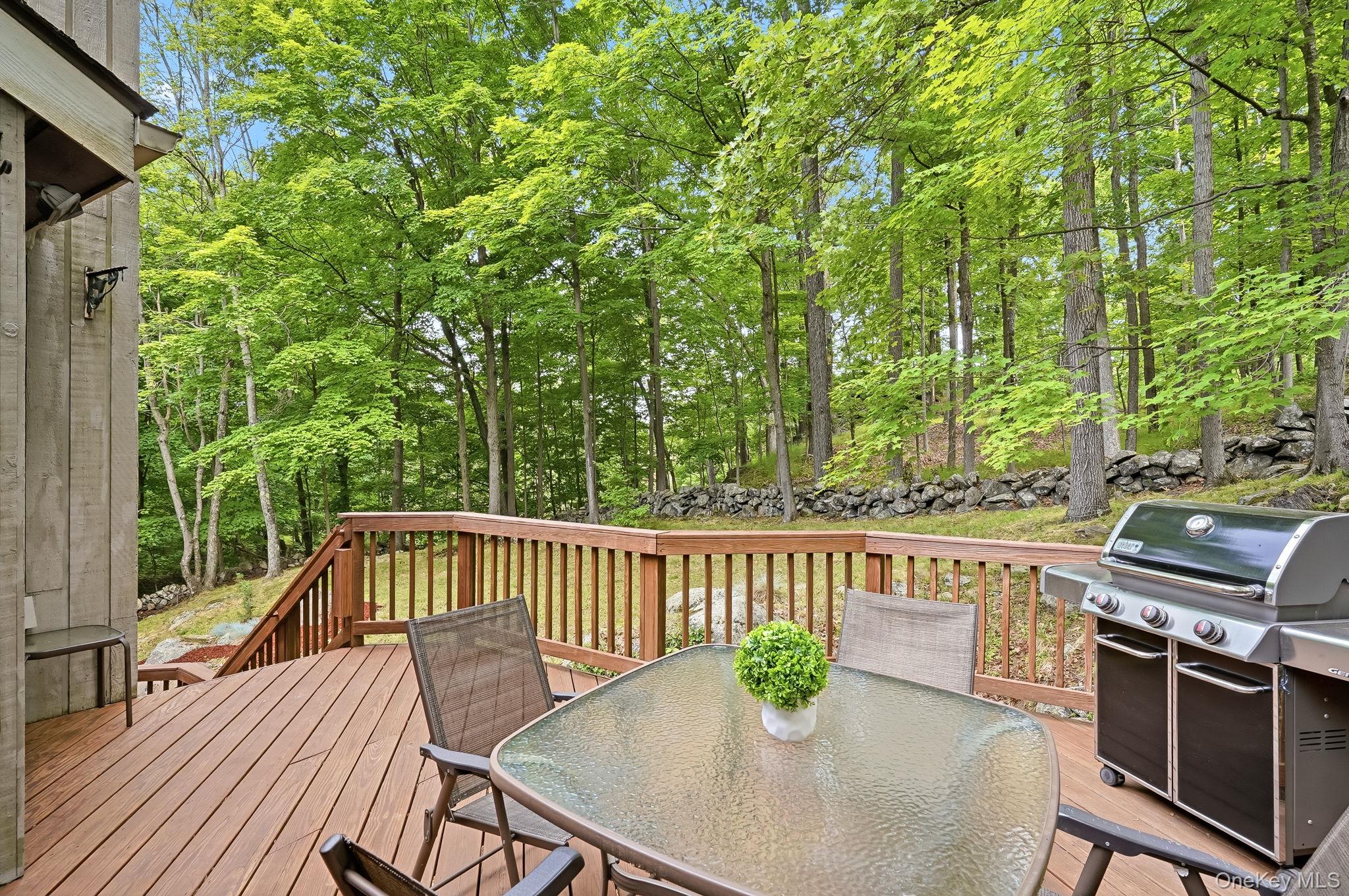43 Powder Horn Road Cortlandt Manor, NY 10567 - Photo 3 of 35 View of the spacious multi-level deck overlooks the backyard