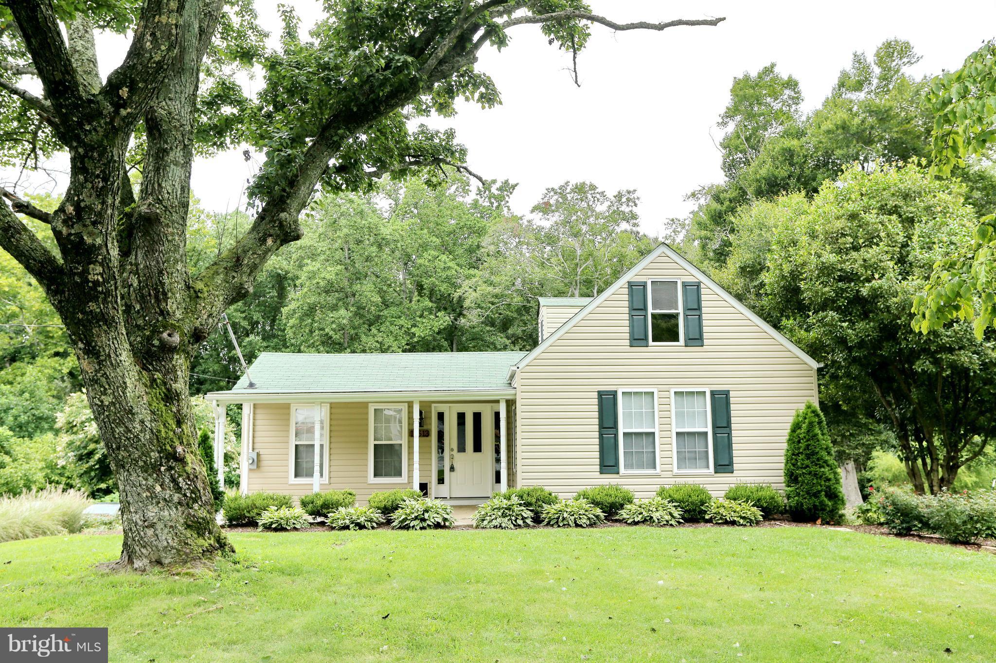 14613 Livingston Road Accokeek, MD 20607 - Photo 3 of 30 a front view of a house with a garden