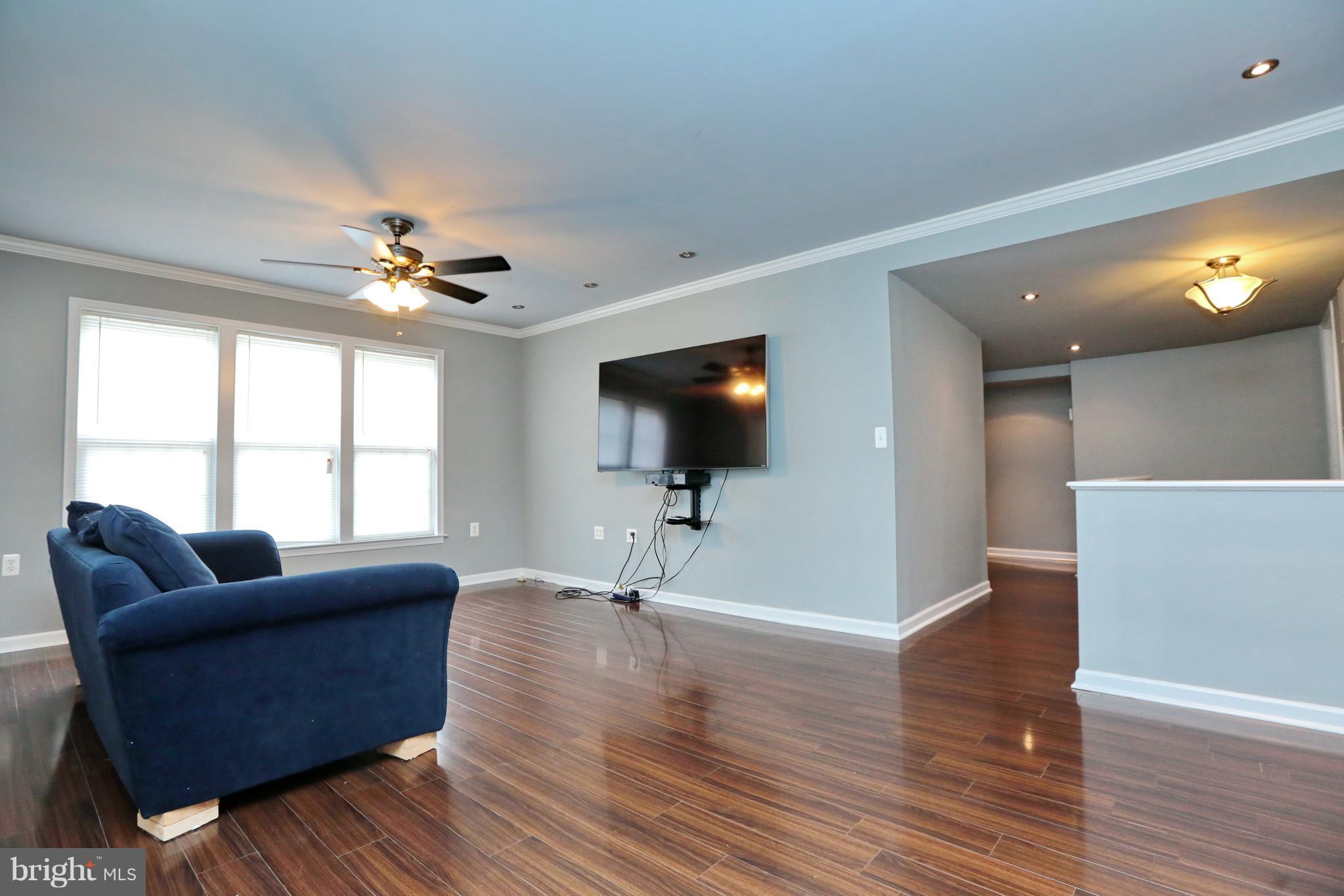 14613 Livingston Road Accokeek, MD 20607 - Photo 8 of 30 a living room with furniture and a flat screen tv