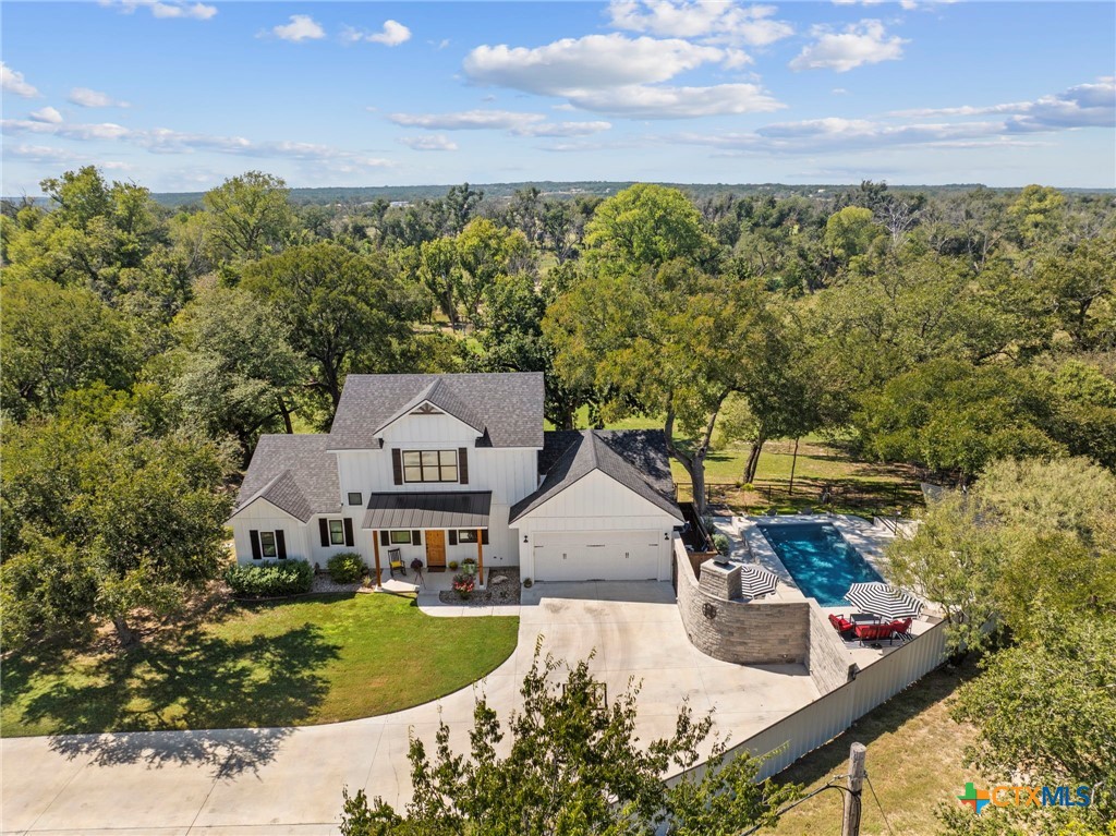 28099 Fm 2670 Killeen, TX 76549 - Photo 43 of 48 an aerial view of a house with a garden