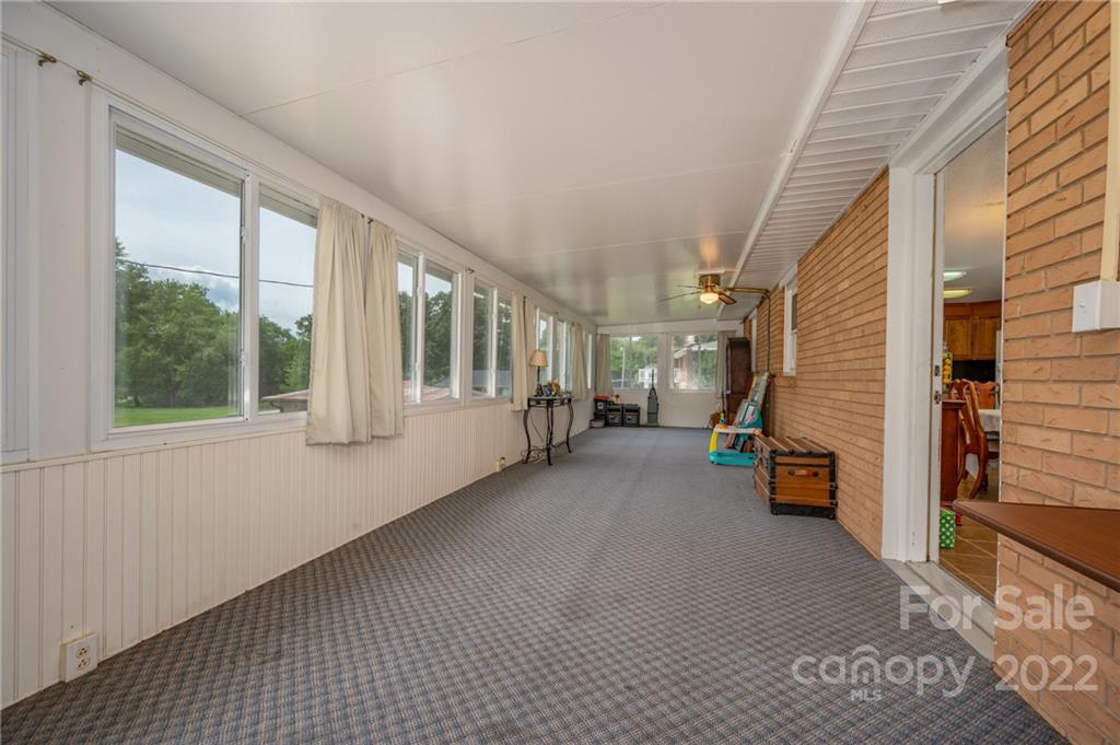 387 Poors Ford Road Rutherfordton, NC 28139 - Photo 15 of 37 a view of hallway with furniture and a window