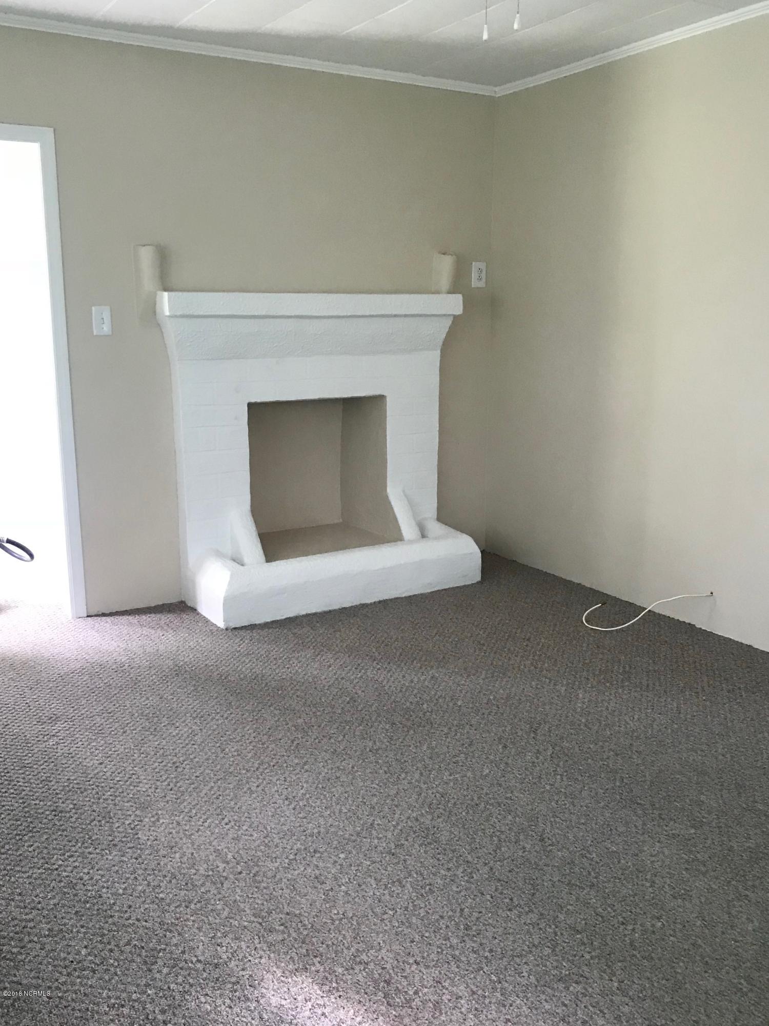 121 Old River Road Beaufort, NC 28516 - Photo 13 of 14 Faux Fireplace in living room