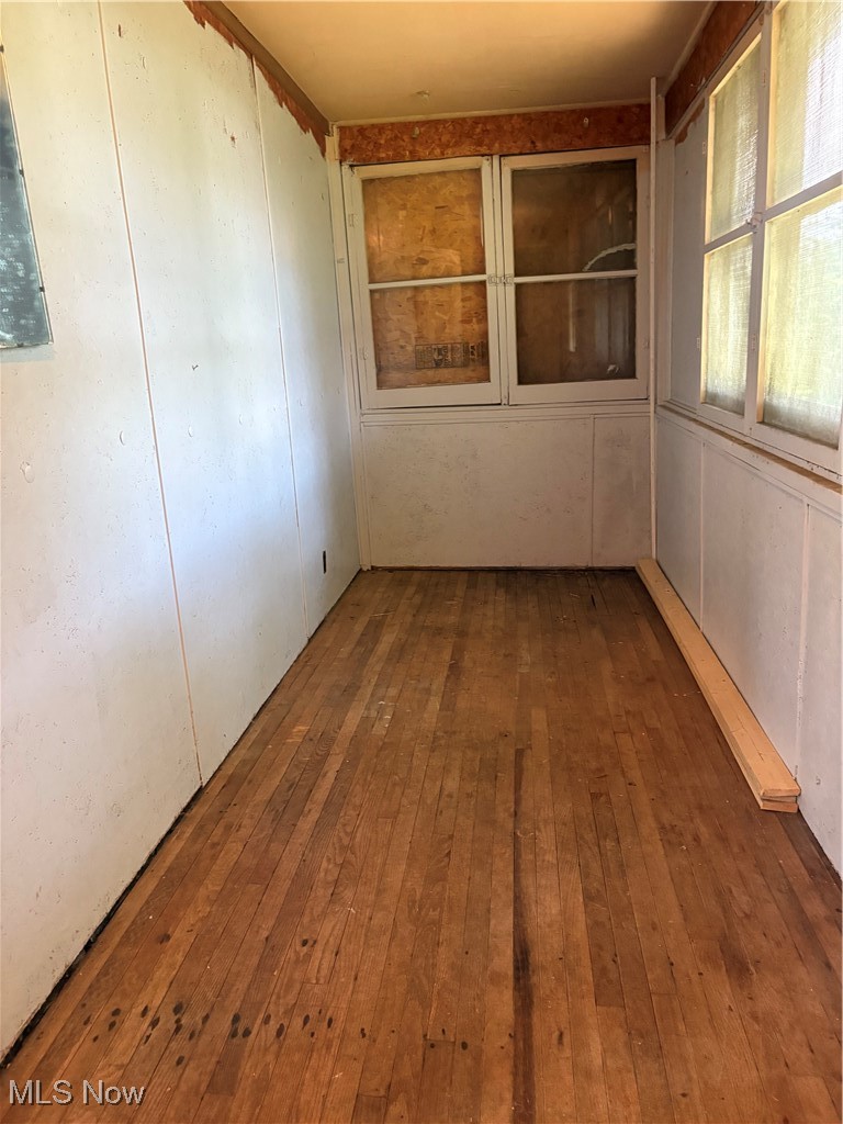 11 Front Street Rittman, OH 44270 - Photo 18 of 31 Unfurnished room featuring wood-type flooring