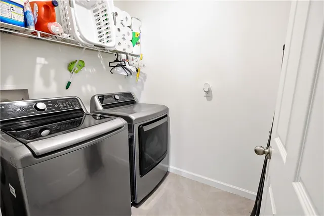 a bedroom with a bed furniture and a window