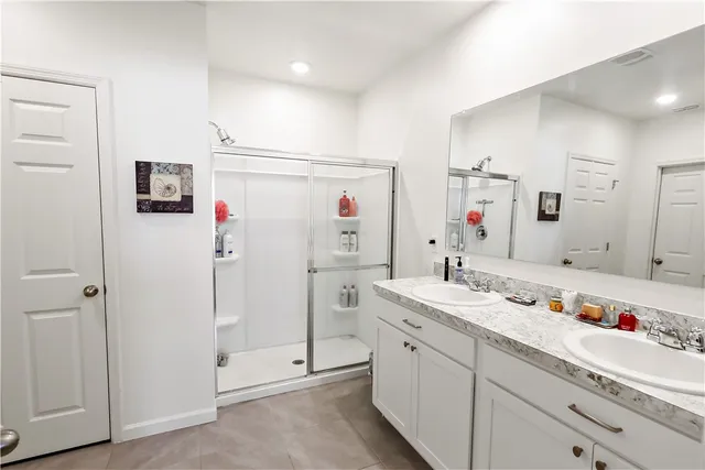 an aerial view of a house with a swimming pool