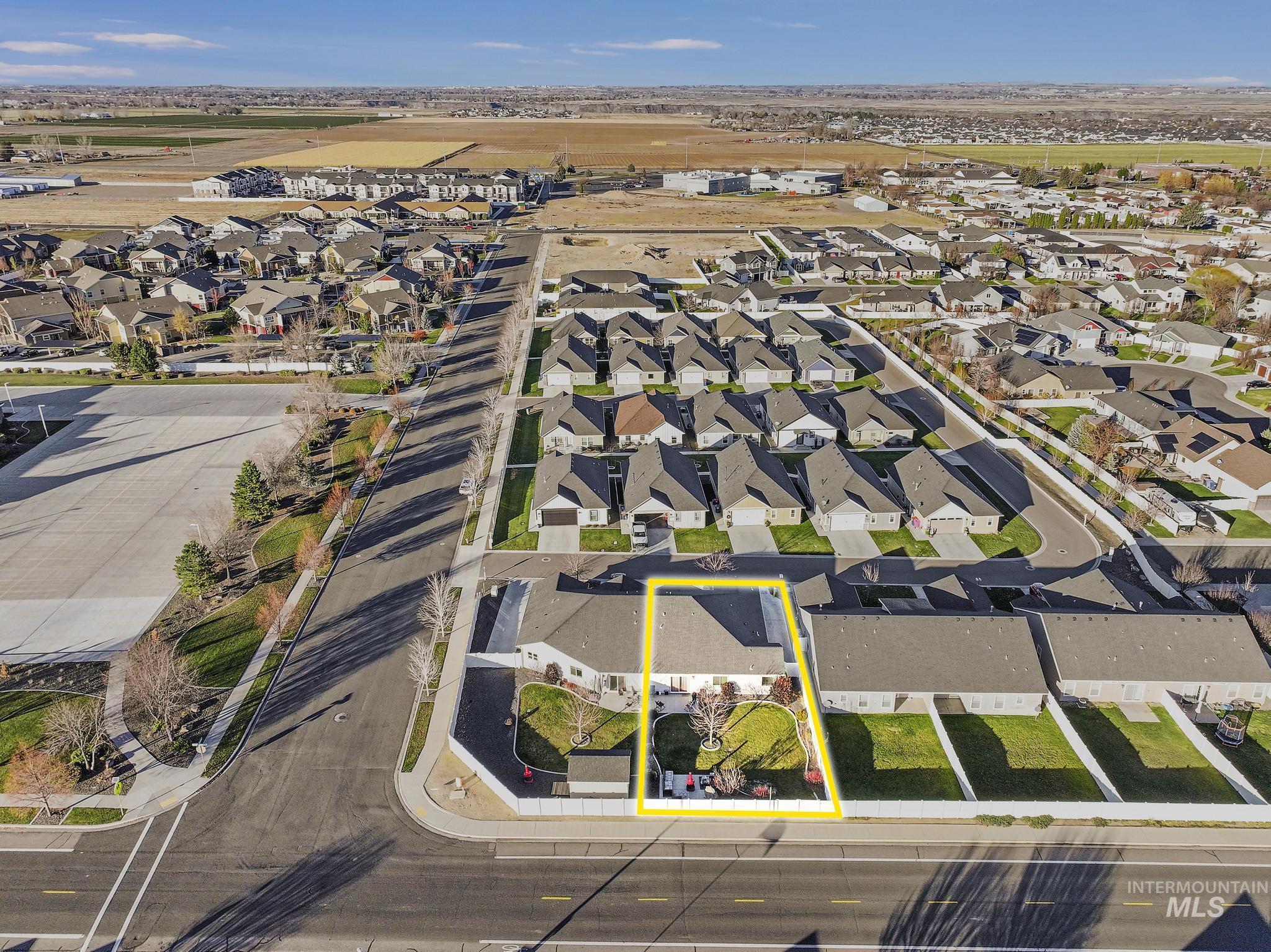 1085 Easy Avenue Twin Falls, ID 83301 - Photo 20 of 22 Aerial view of property and surrounding area featuring nearby suburban area and property parcel outlined