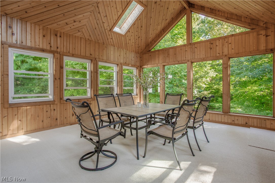 9005 River Styx Road Wadsworth, OH 44281 - Photo 8 of 25 Cedar paneled three season room is surrounded by trees and provides a peaceful are to have your morning coffee and entertain guests as well.