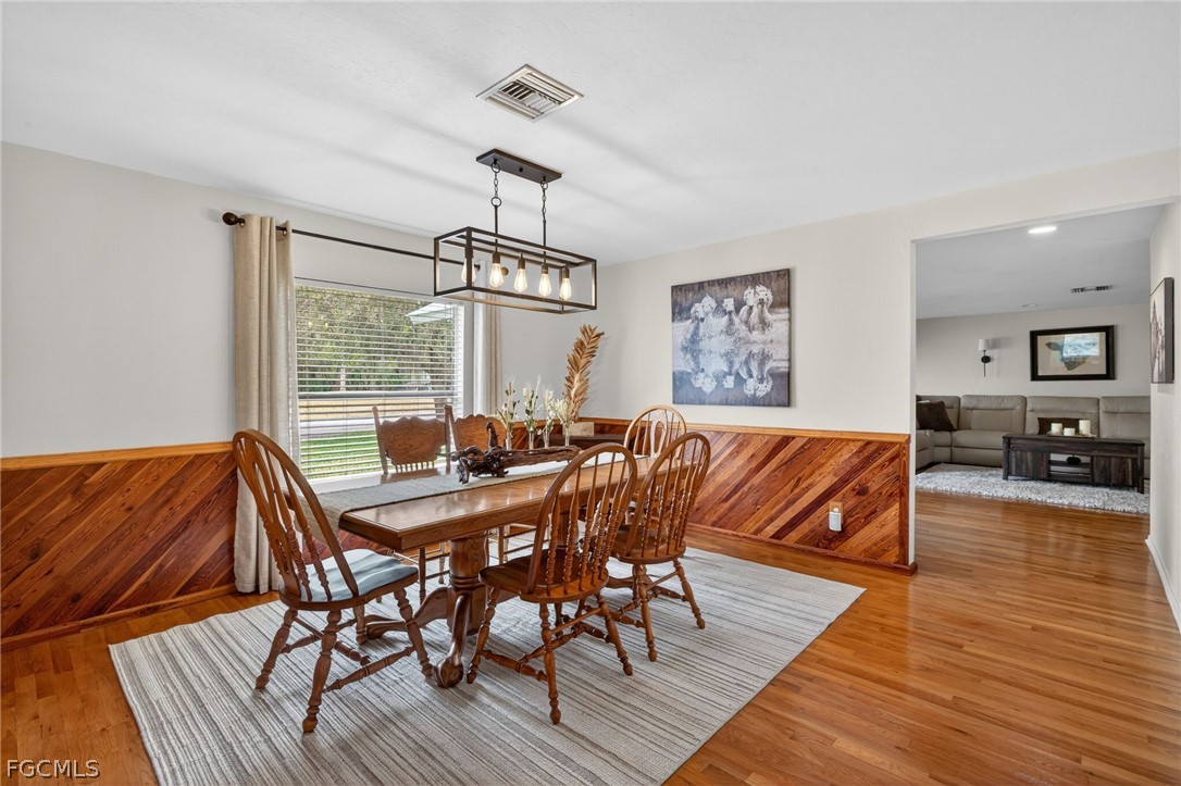3790 Goggin Road Alva, FL 33920 - Photo 6 of 38 a view of a dining room with furniture window and wooden floor