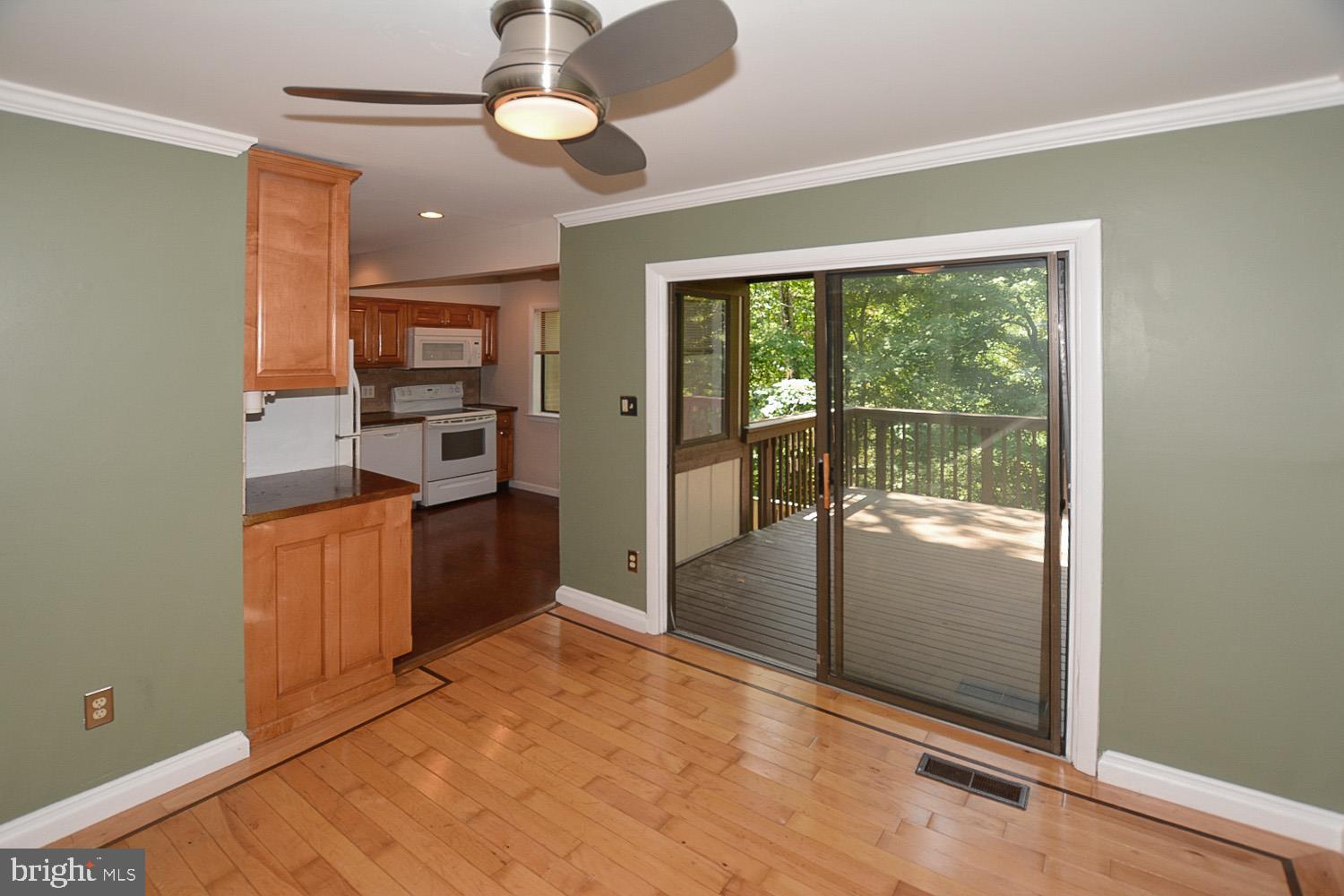 8568 Gwynedd Way Springfield, VA 22153 - Photo 12 of 30 Dining Room Leads to Custom Deck