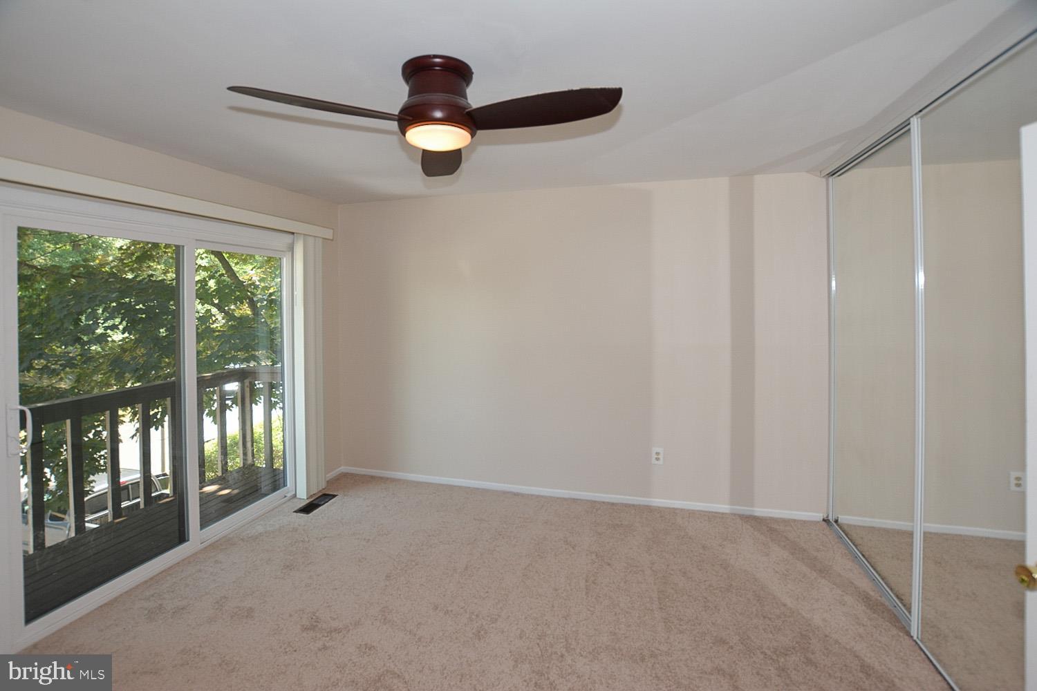 8568 Gwynedd Way Springfield, VA 22153 - Photo 14 of 30 Spacious Master Bedroom with Ceiling Fan
