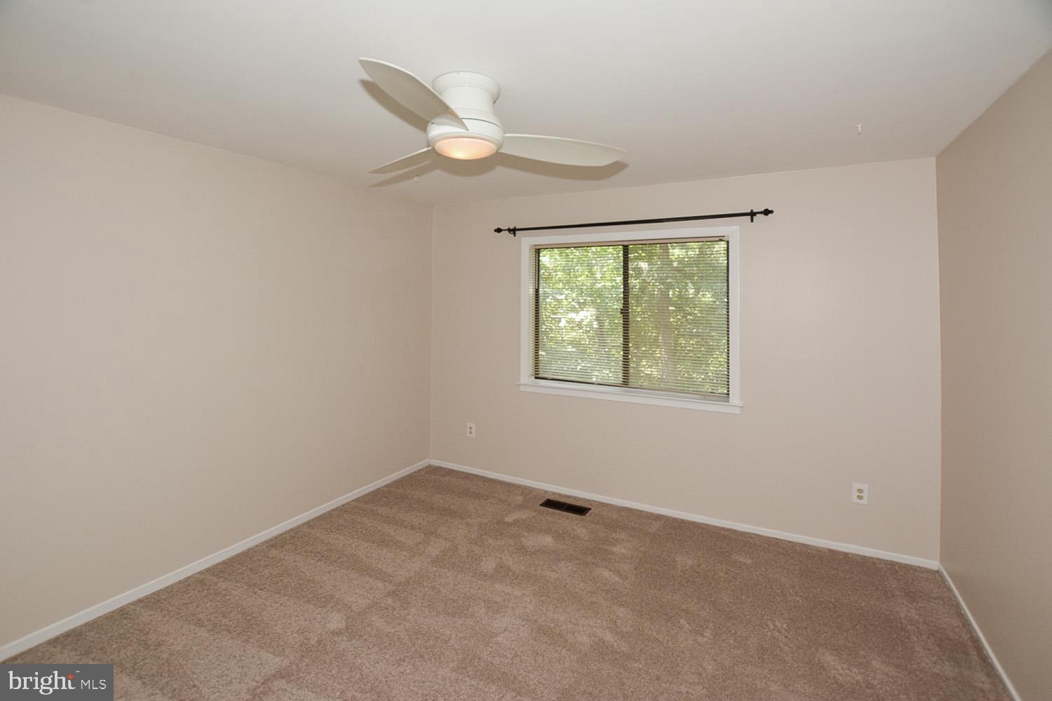 8568 Gwynedd Way Springfield, VA 22153 - Photo 18 of 30 Spacious 13X12 Second Bedroom w/Ceiling Fan