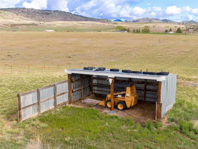 a view of a house with a floor and a ocean view