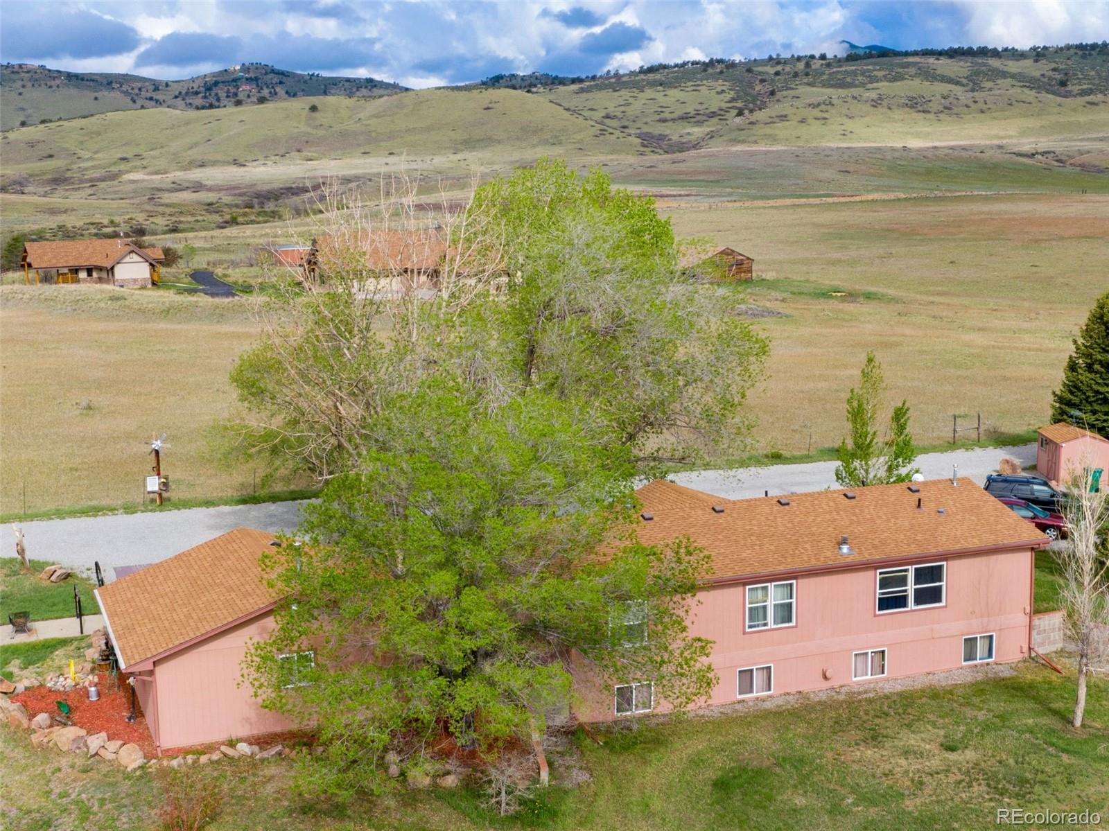 6310 West Co Road 4 Berthoud, CO 80513 - Photo 46 of 49 a aerial view of residential houses with outdoor space
