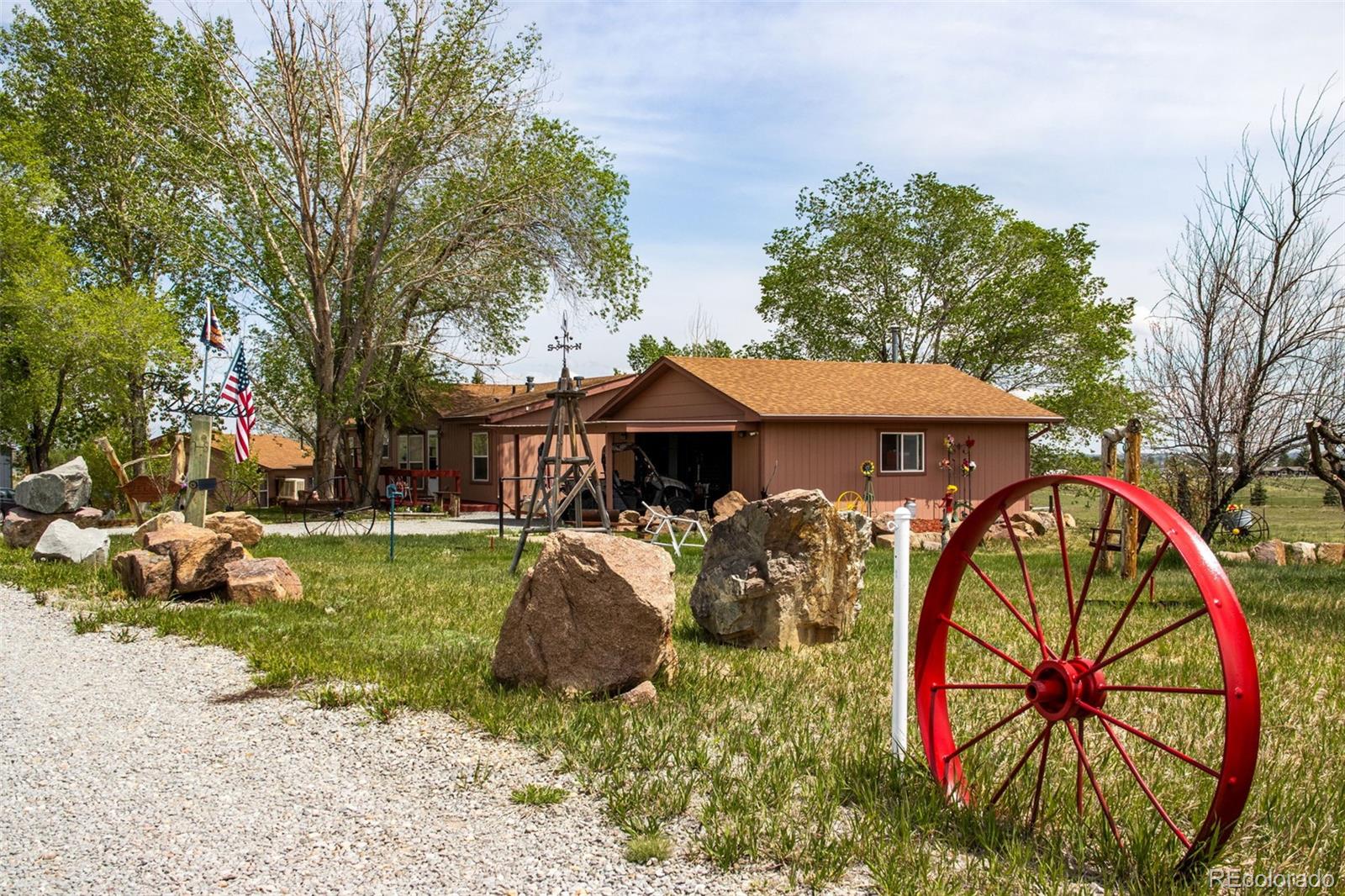 6310 West Co Road 4 Berthoud, CO 80513 - Photo 47 of 49 a view of house with outdoor space and entertaining space