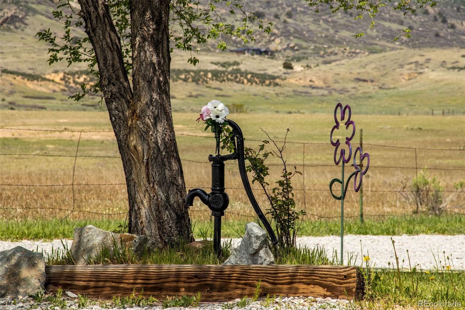 6310 West Co Road 4 Berthoud, CO 80513 - Photo 6 of 49 a view of swimming pool with a yard