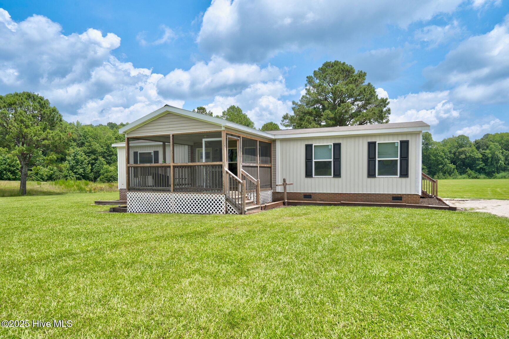 7022 Flower Hill Road Middlesex, NC 27557 - Photo 1 of 34 Front
