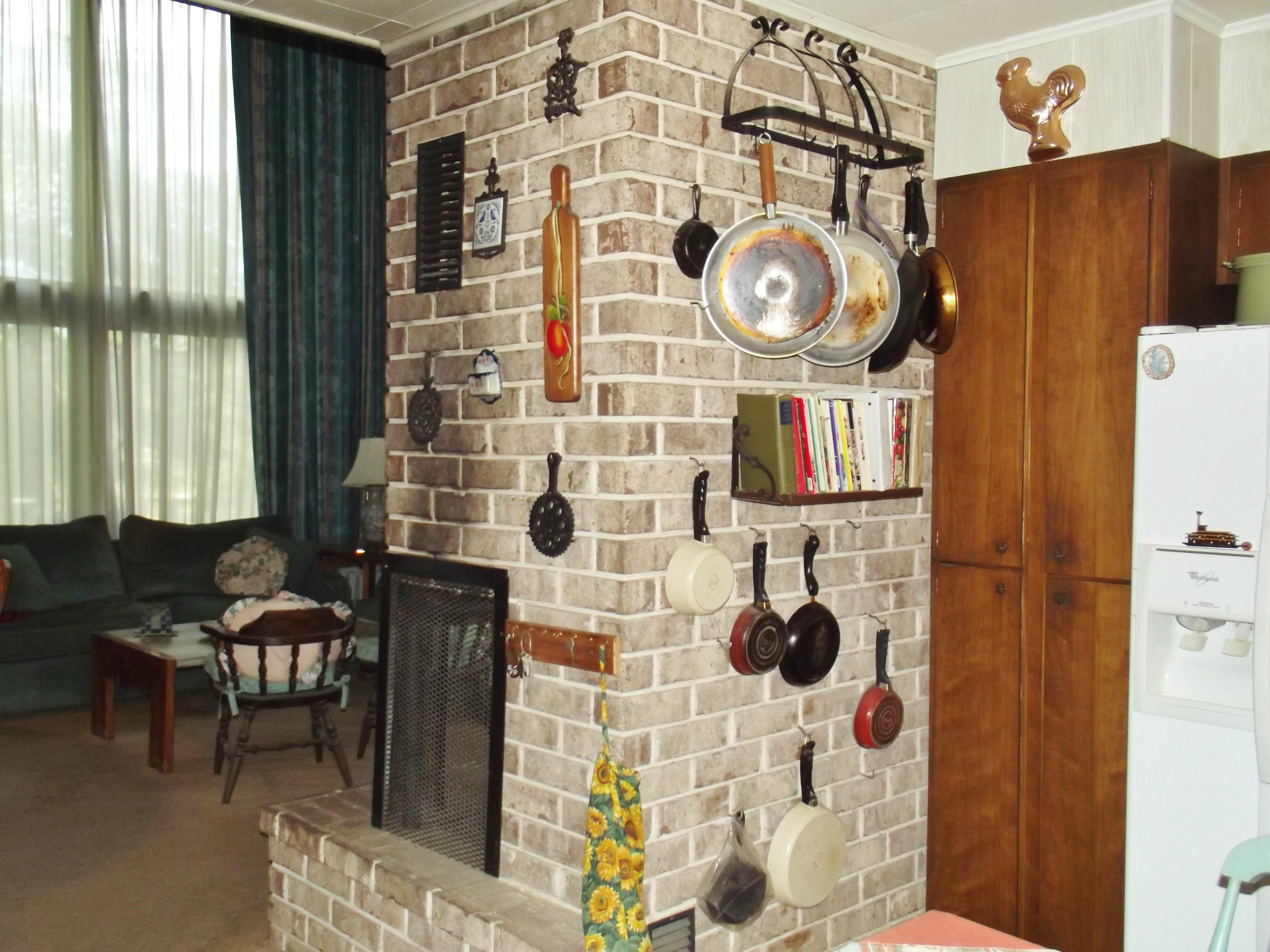 714 Hilltop Road Spring City, TN 37381 - Photo 6 of 33 back of fireplace in kitchen