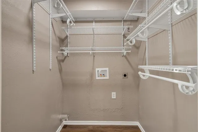 a view of a room with racks on the wall