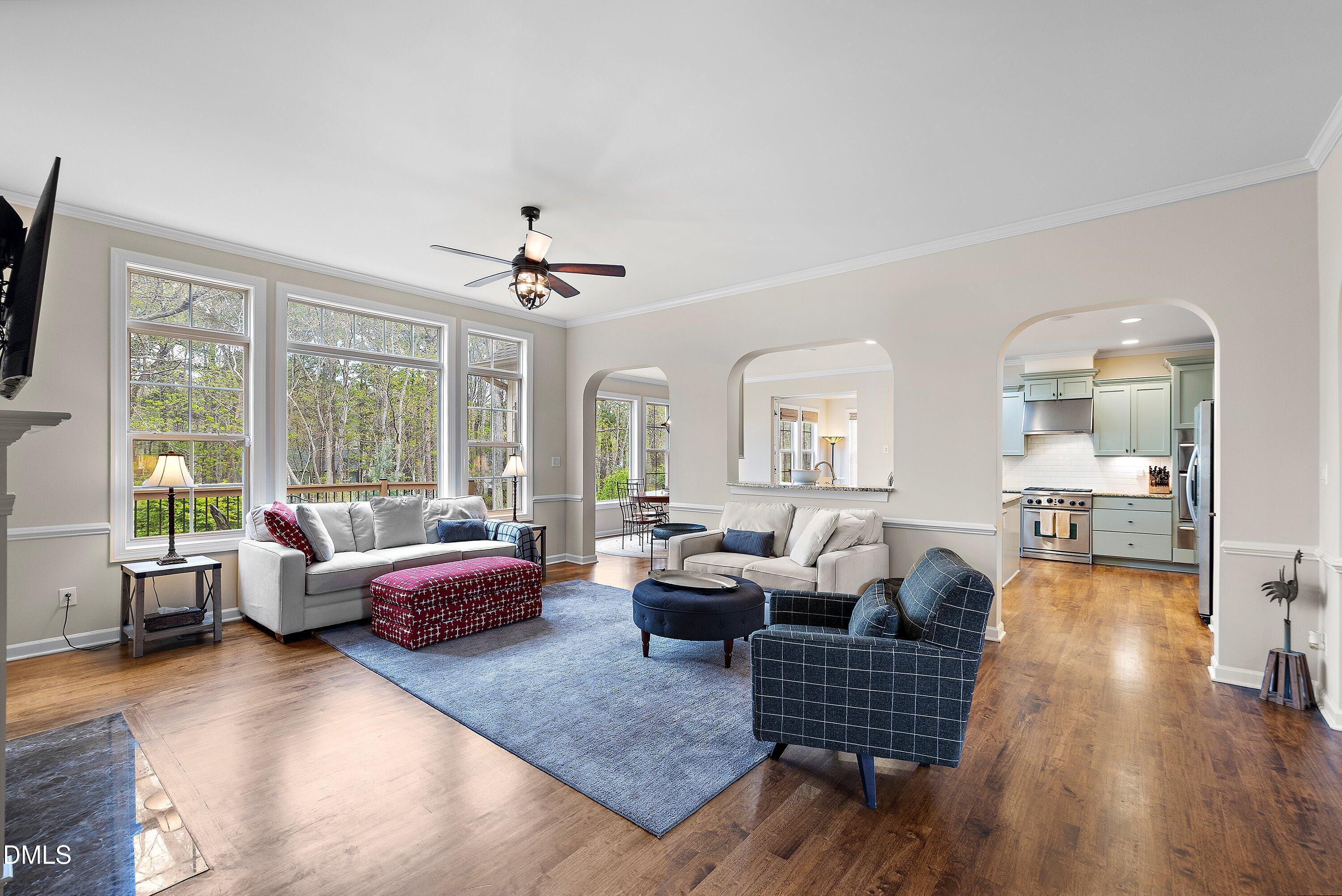 701 Royal Tower Way Cary, NC 27513 - Photo 11 of 82 a living room with furniture and wooden floor