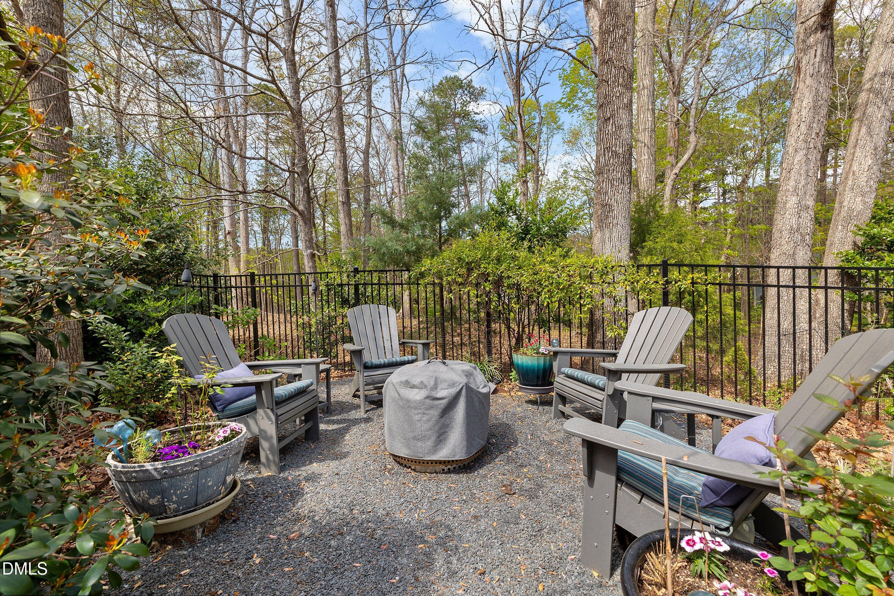 701 Royal Tower Way Cary, NC 27513 - Photo 2 of 82 a view of a patio with couches chairs and a potted plant