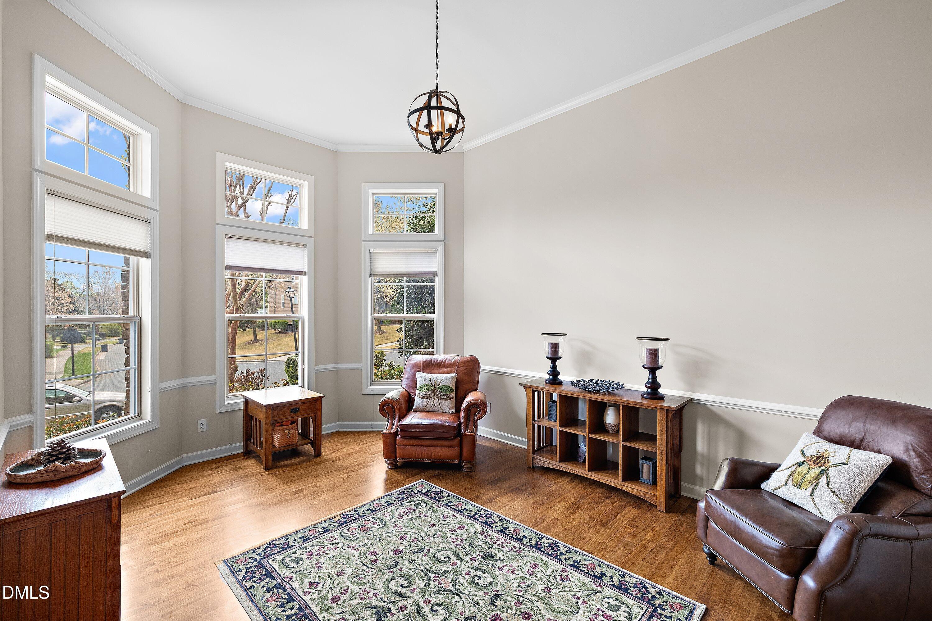 701 Royal Tower Way Cary, NC 27513 - Photo 23 of 82 a living room with furniture and a window