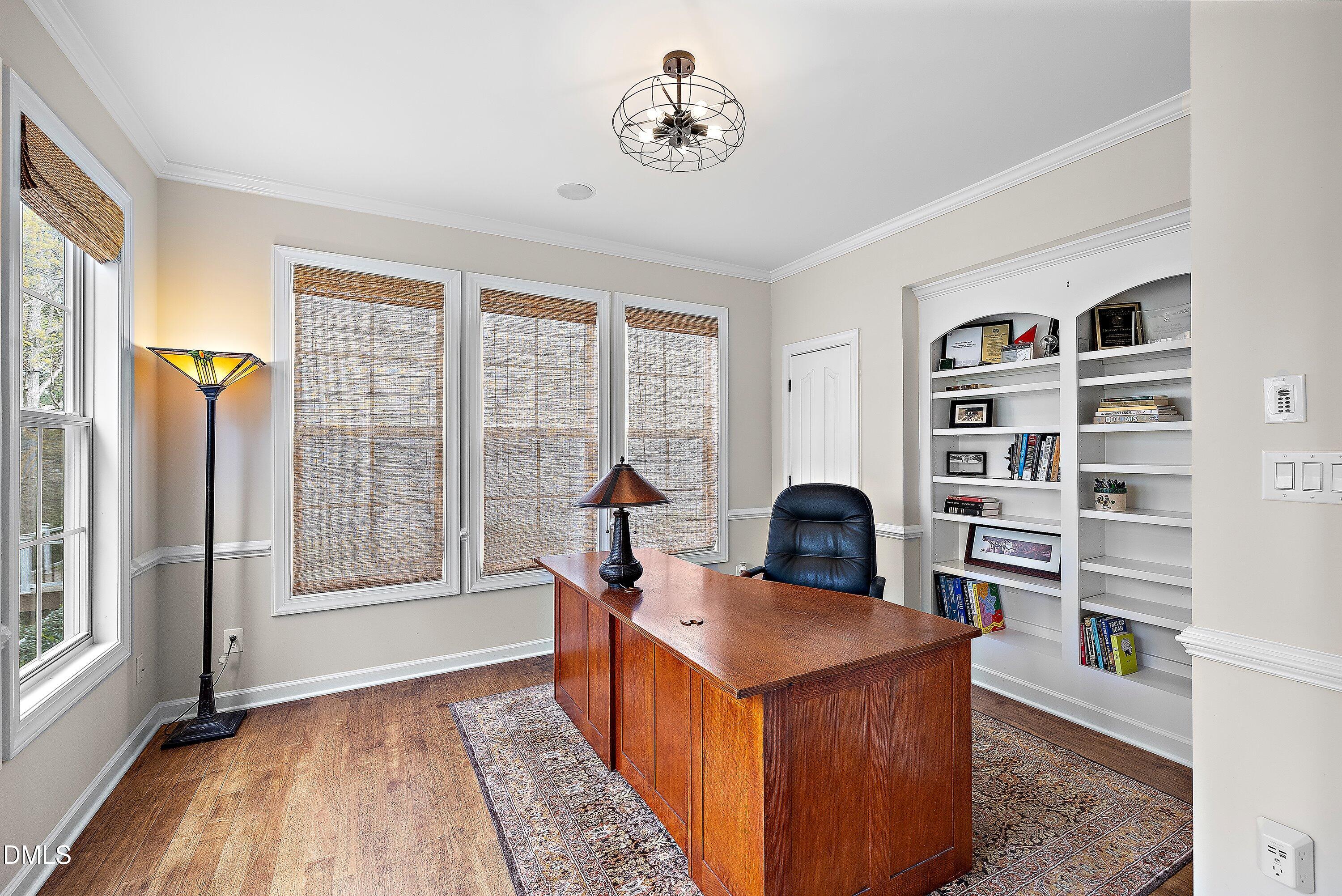 701 Royal Tower Way Cary, NC 27513 - Photo 33 of 82 a view of a workspace with furniture and a window