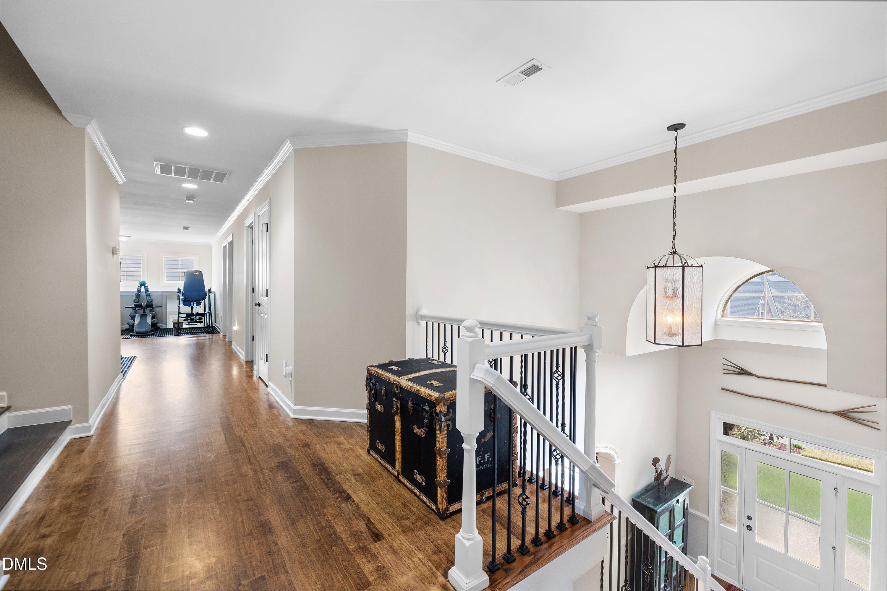 701 Royal Tower Way Cary, NC 27513 - Photo 42 of 82 a view of an entryway with wooden floor