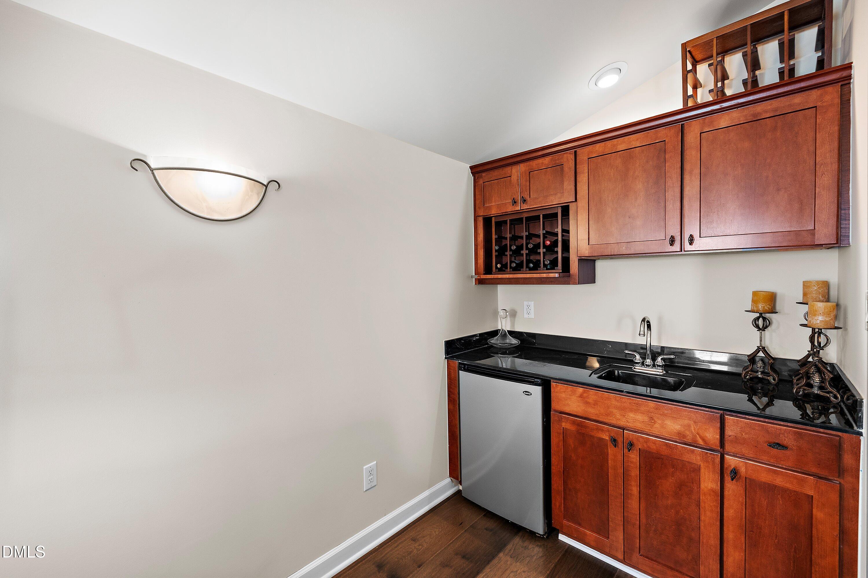 701 Royal Tower Way Cary, NC 27513 - Photo 49 of 82 a kitchen with a sink and cabinets