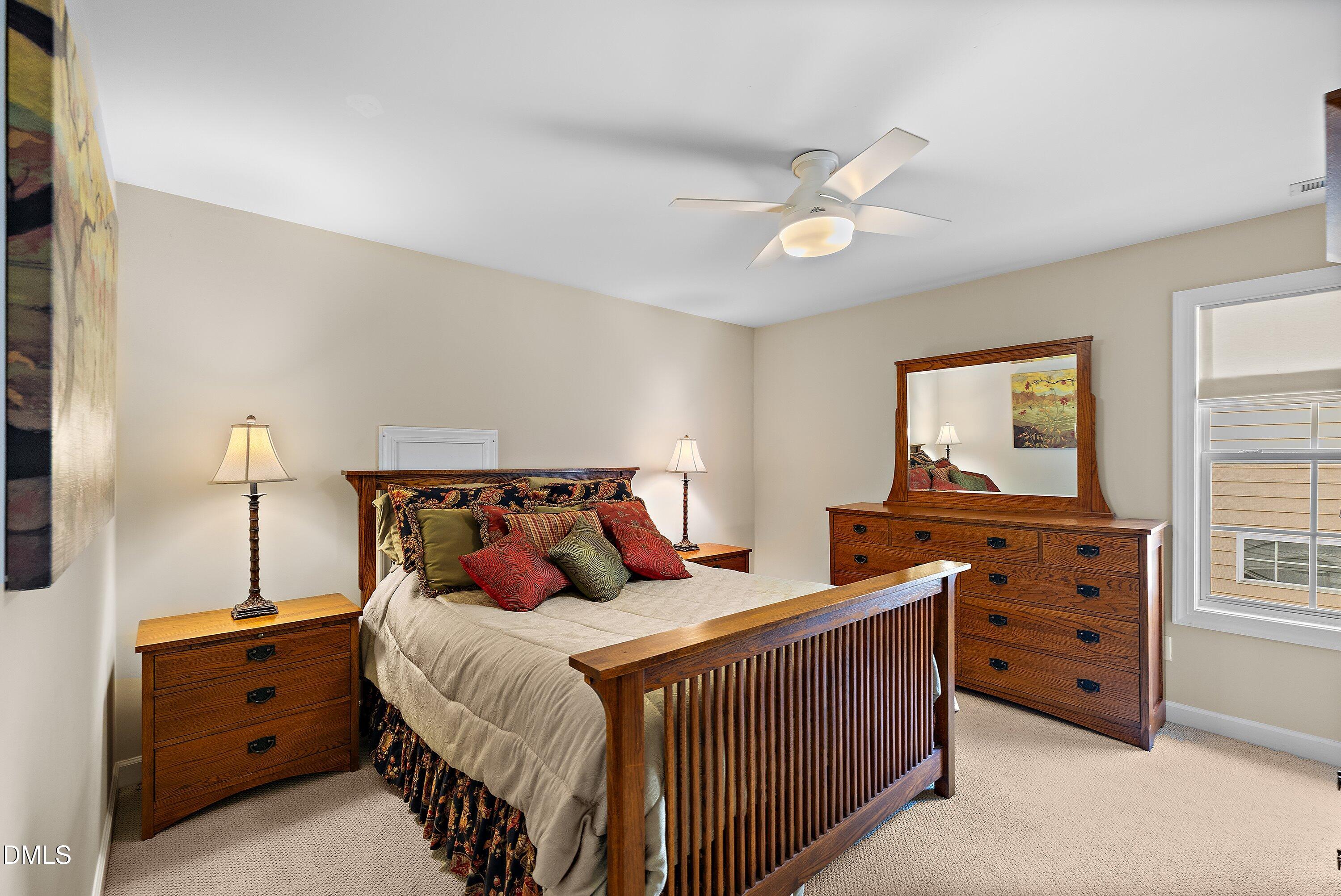 701 Royal Tower Way Cary, NC 27513 - Photo 50 of 82 a bedroom with two beds and a window