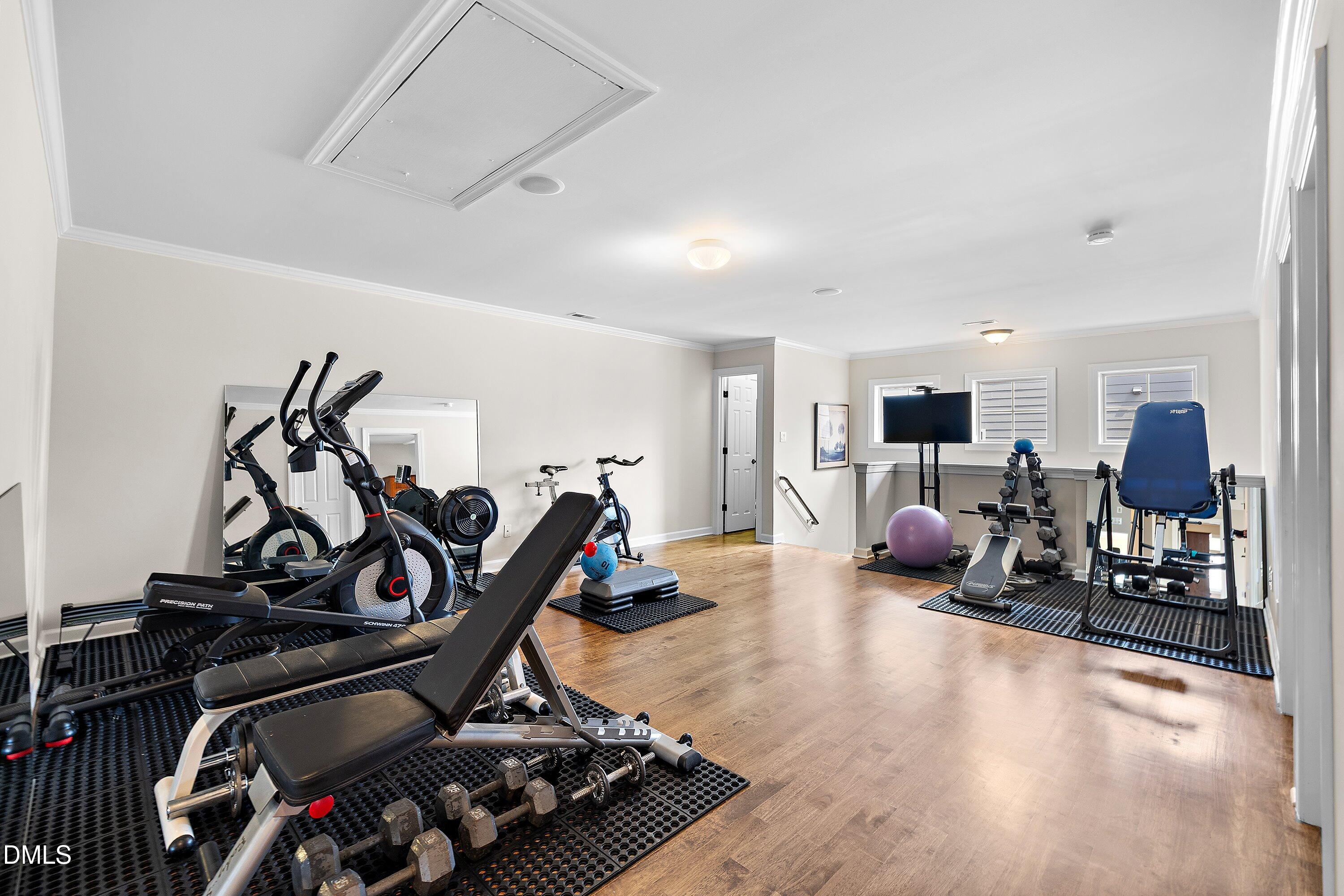 701 Royal Tower Way Cary, NC 27513 - Photo 55 of 82 a view of a room with gym equipment