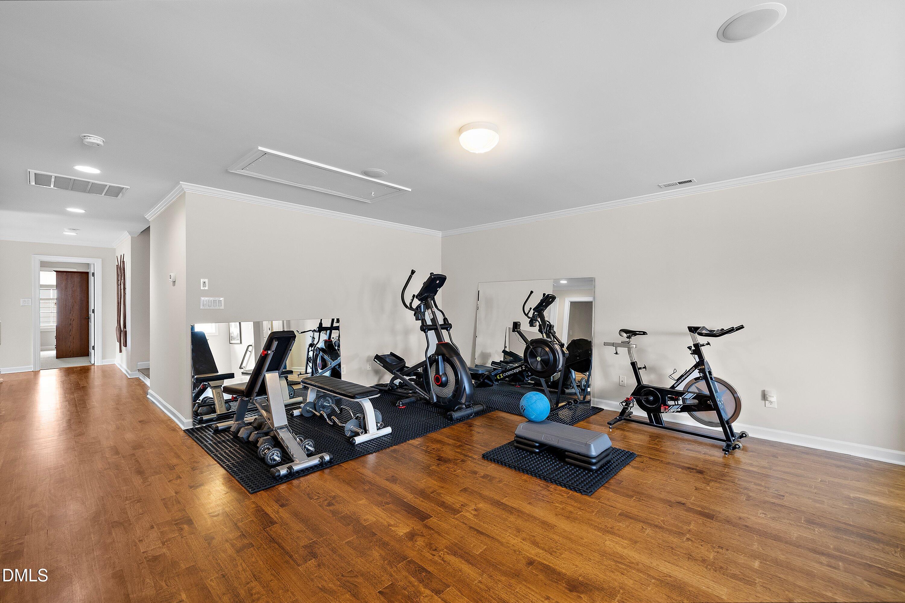 701 Royal Tower Way Cary, NC 27513 - Photo 57 of 82 a view of a room with gym equipment