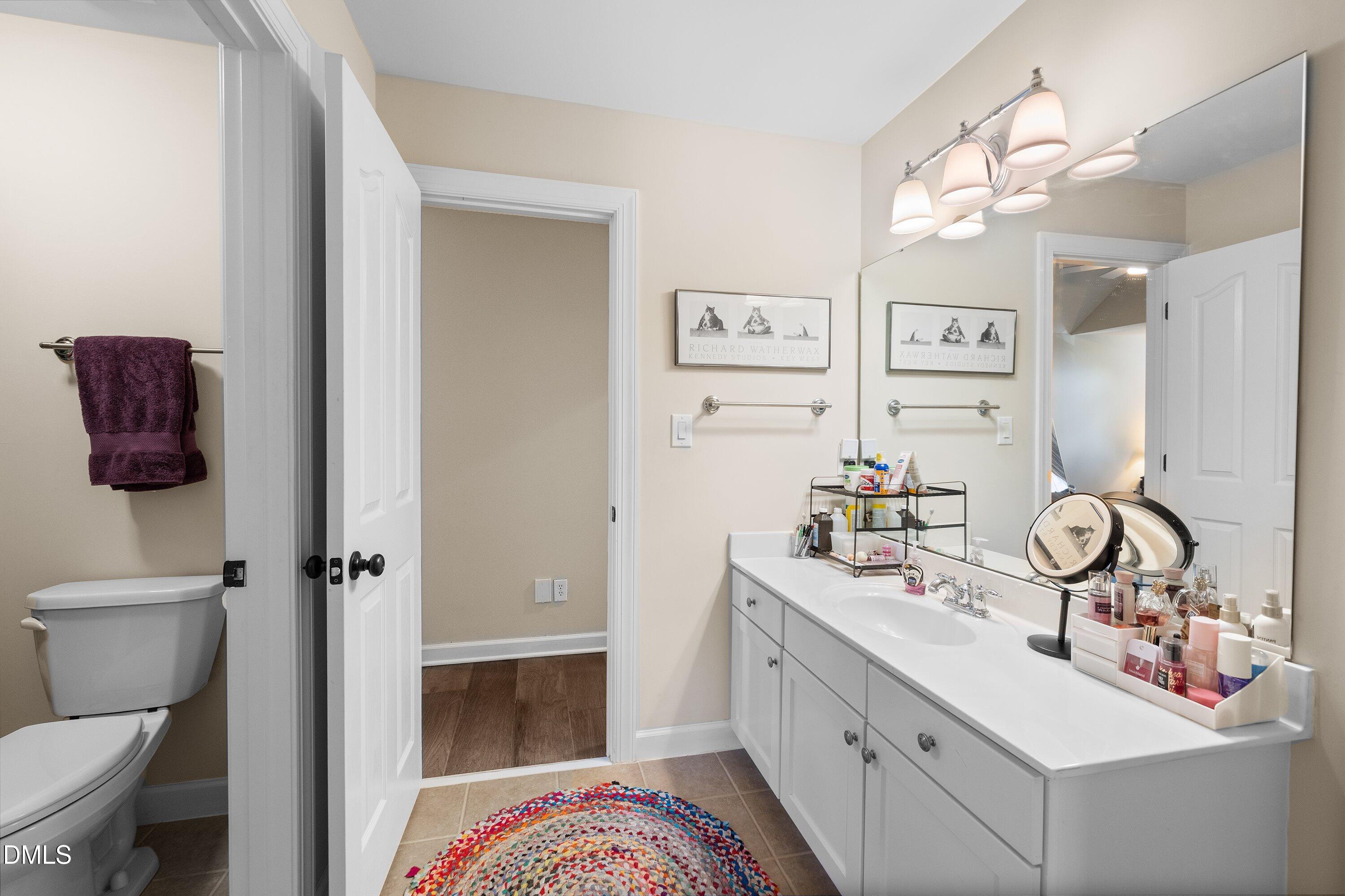 701 Royal Tower Way Cary, NC 27513 - Photo 60 of 82 a bathroom with a sink toilet and shower