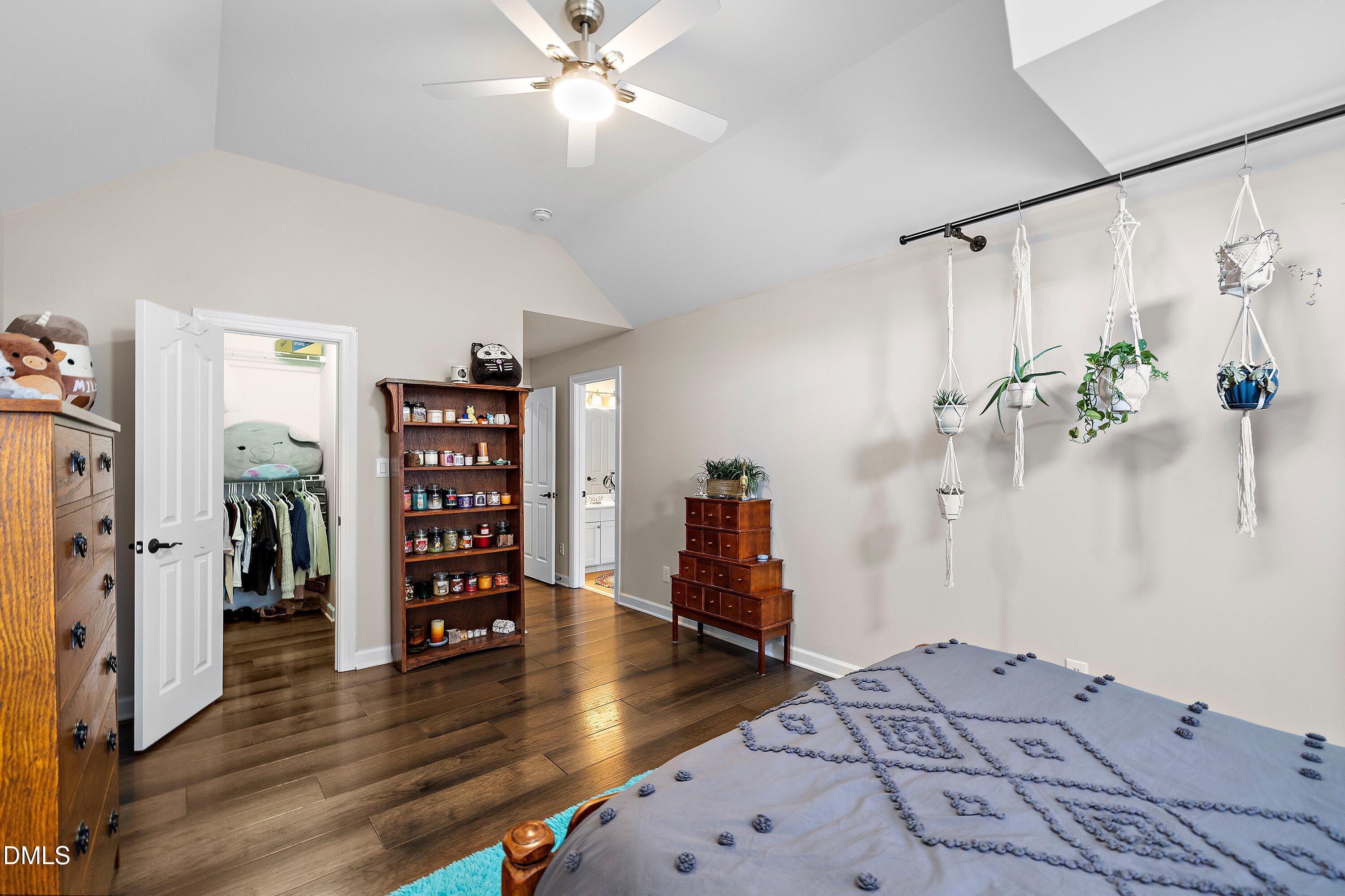 701 Royal Tower Way Cary, NC 27513 - Photo 64 of 82 a view of a bedroom with furniture and wooden floor