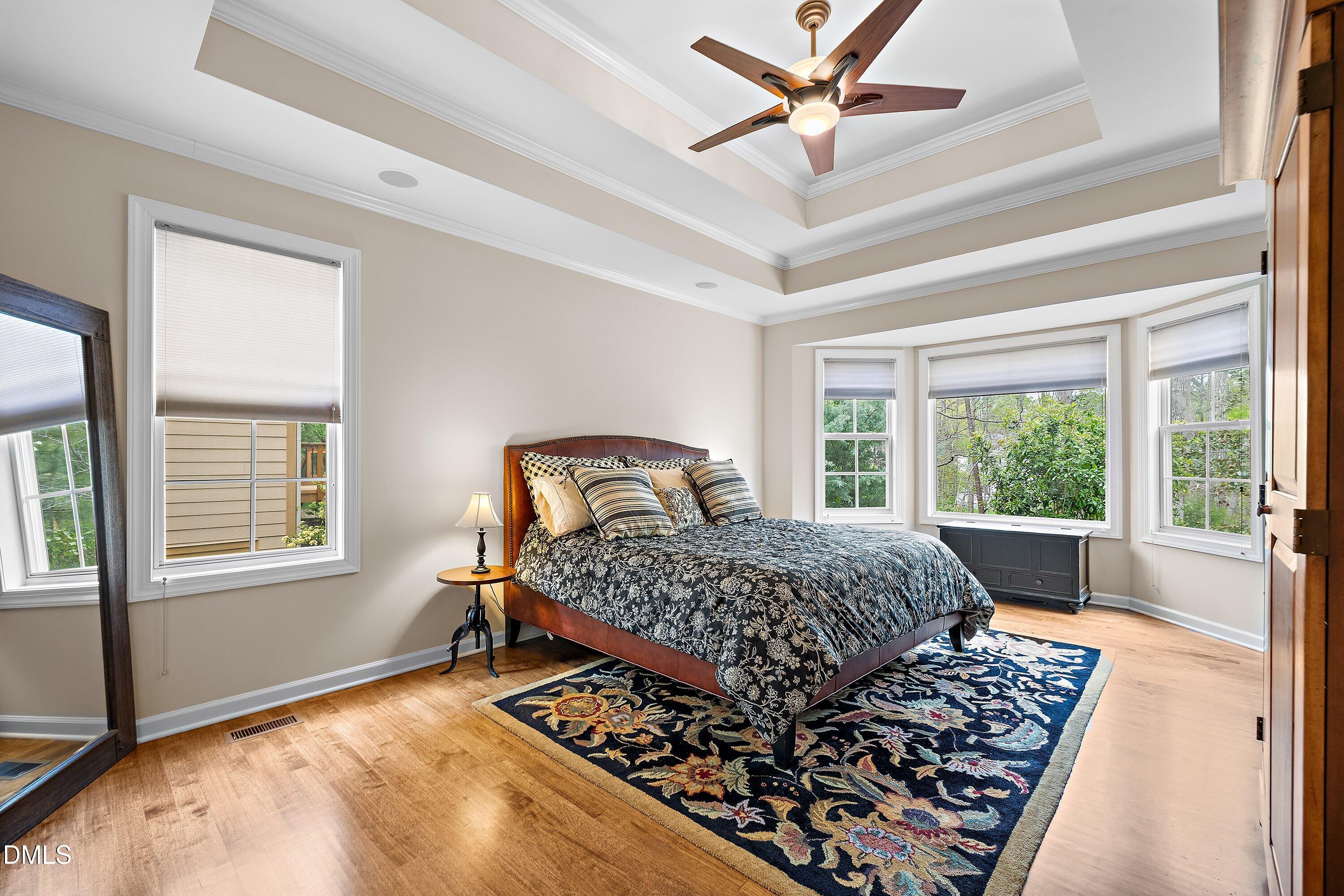 701 Royal Tower Way Cary, NC 27513 - Photo 7 of 82 a bedroom with a large bed and a window