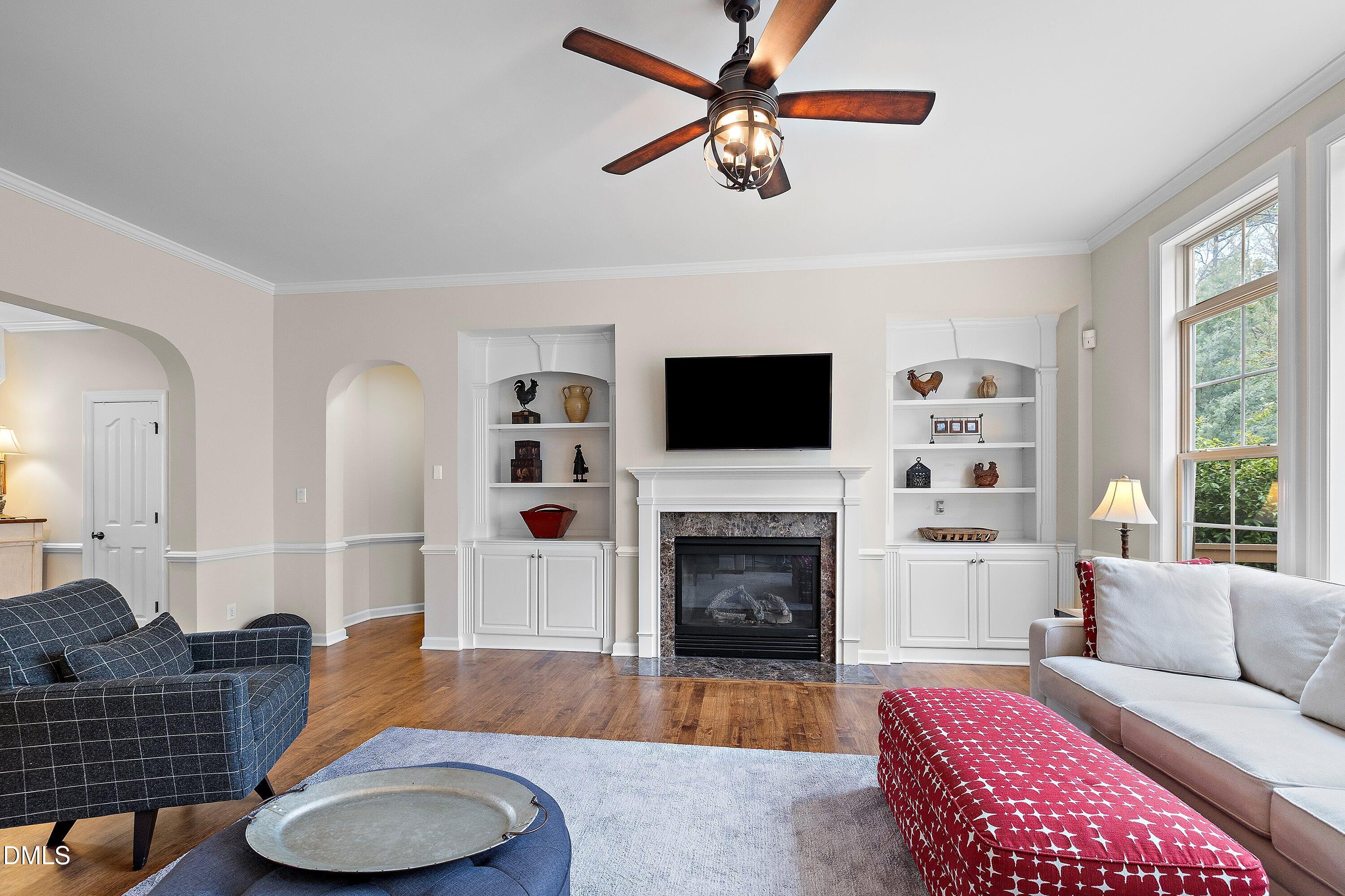 701 Royal Tower Way Cary, NC 27513 - Photo 9 of 82 a living room with furniture and a fireplace