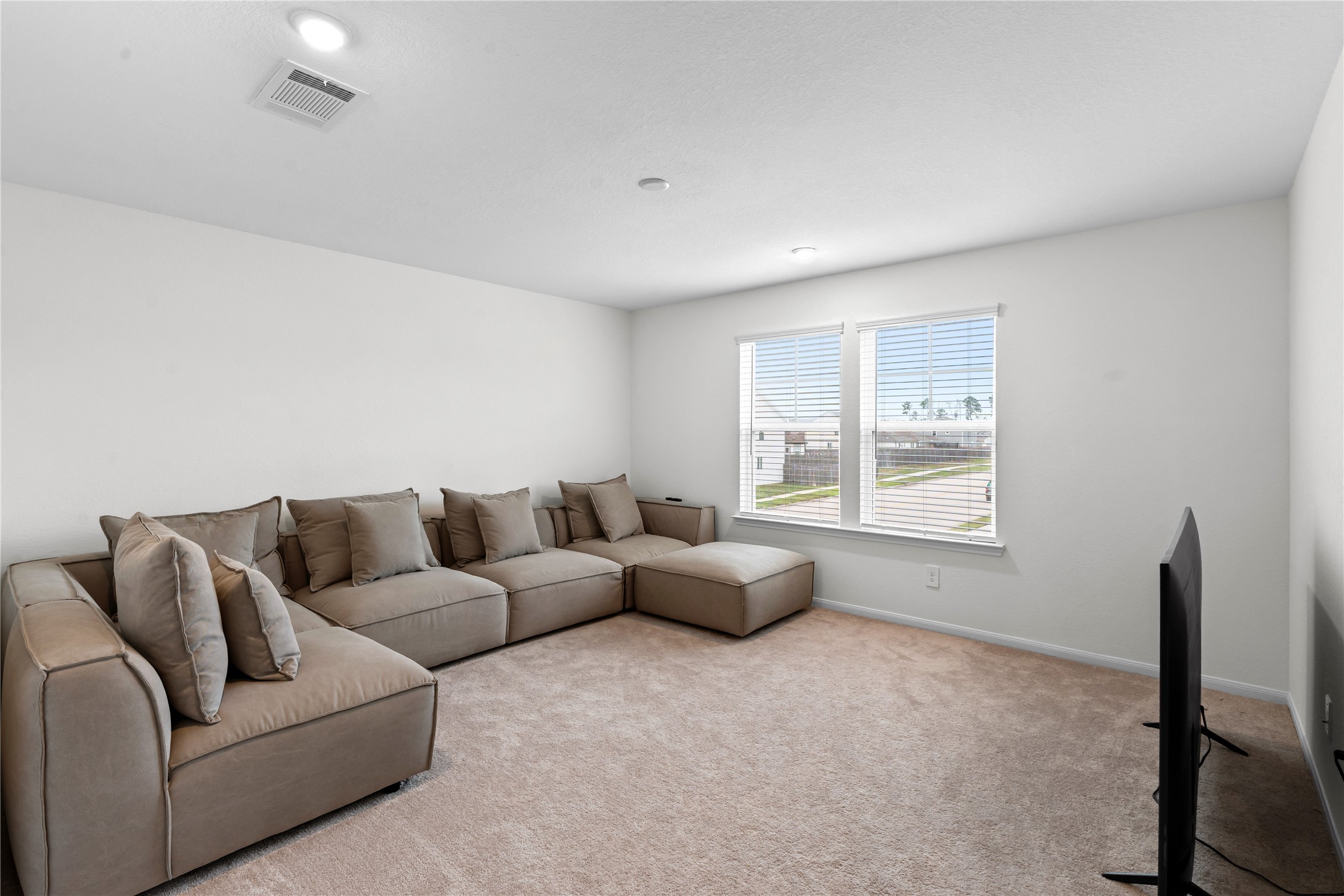 23439 Wrexham Street Spring, TX 77373 - Photo 17 of 26 a living room with furniture and a window