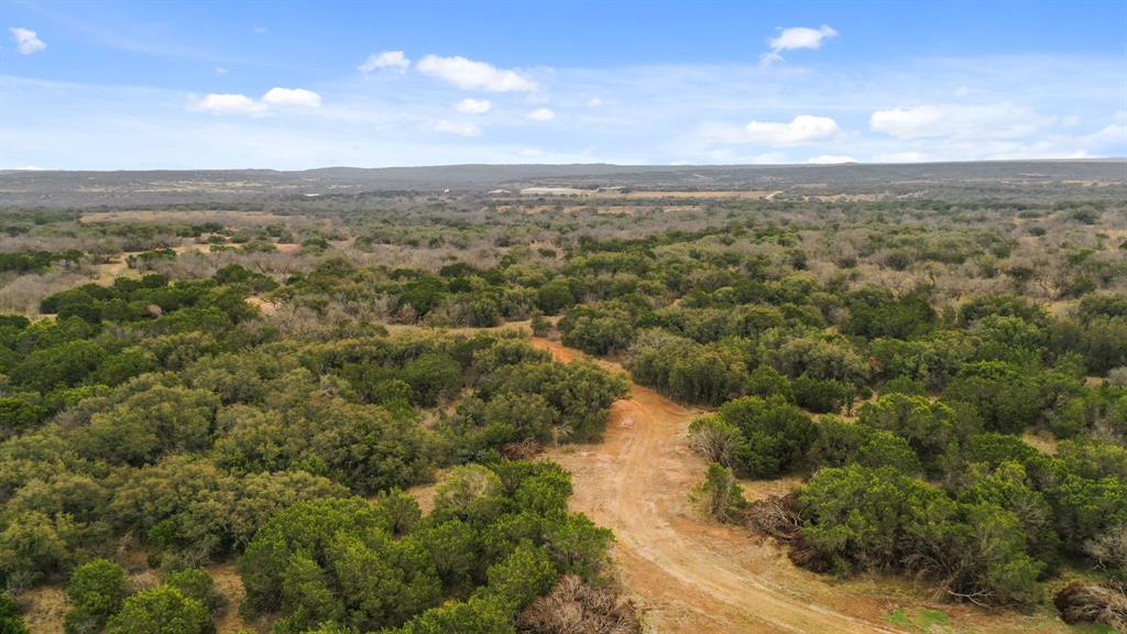 104 County Road 104 Cisco, TX 76437 - Photo 6 of 21 an aerial view of residential houses with outdoor space and trees