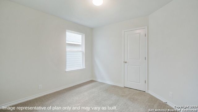 632 Fluted Shoals Cibolo, TX 78108 - Photo 14 of 24 a view of an empty room with a window