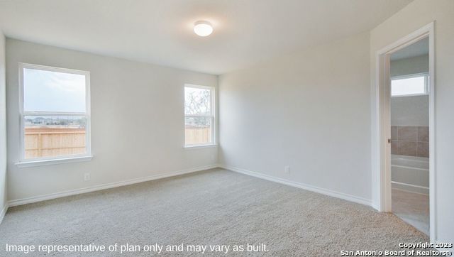 632 Fluted Shoals Cibolo, TX 78108 - Photo 9 of 24 an empty room with windows