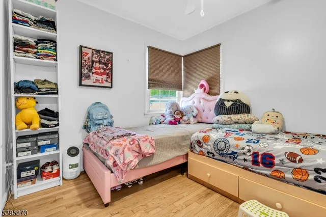 a bedroom with a bed and a closet