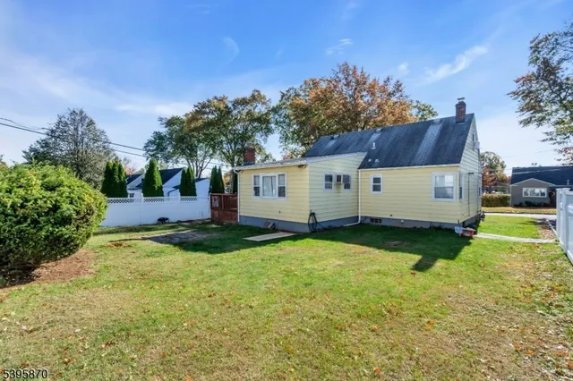 a view of a back yard of the house