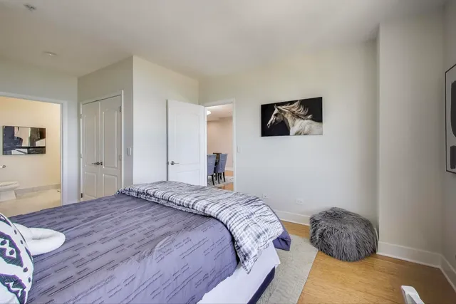 a en suite bathroom with double sink and a mirror