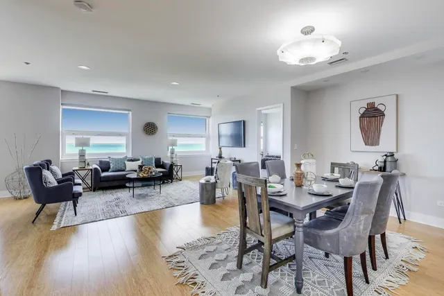 a bedroom with a bed and a lamp on table