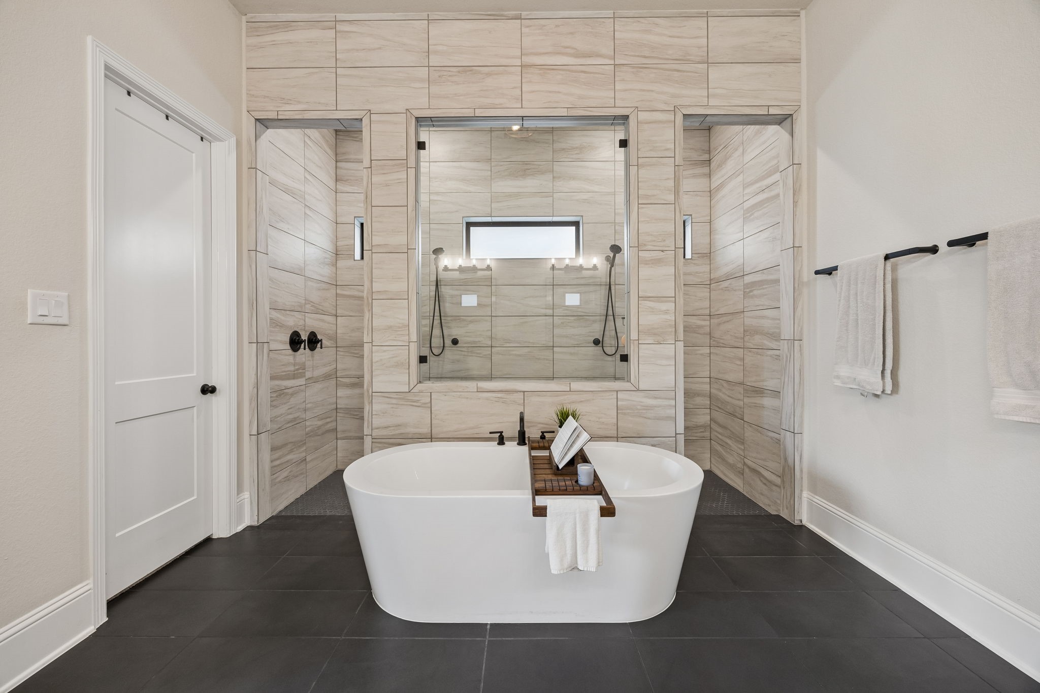 10102 South Goshawk Trail Conroe, TX 77385 - Photo 15 of 46 a white bath tub sitting next to a white sink