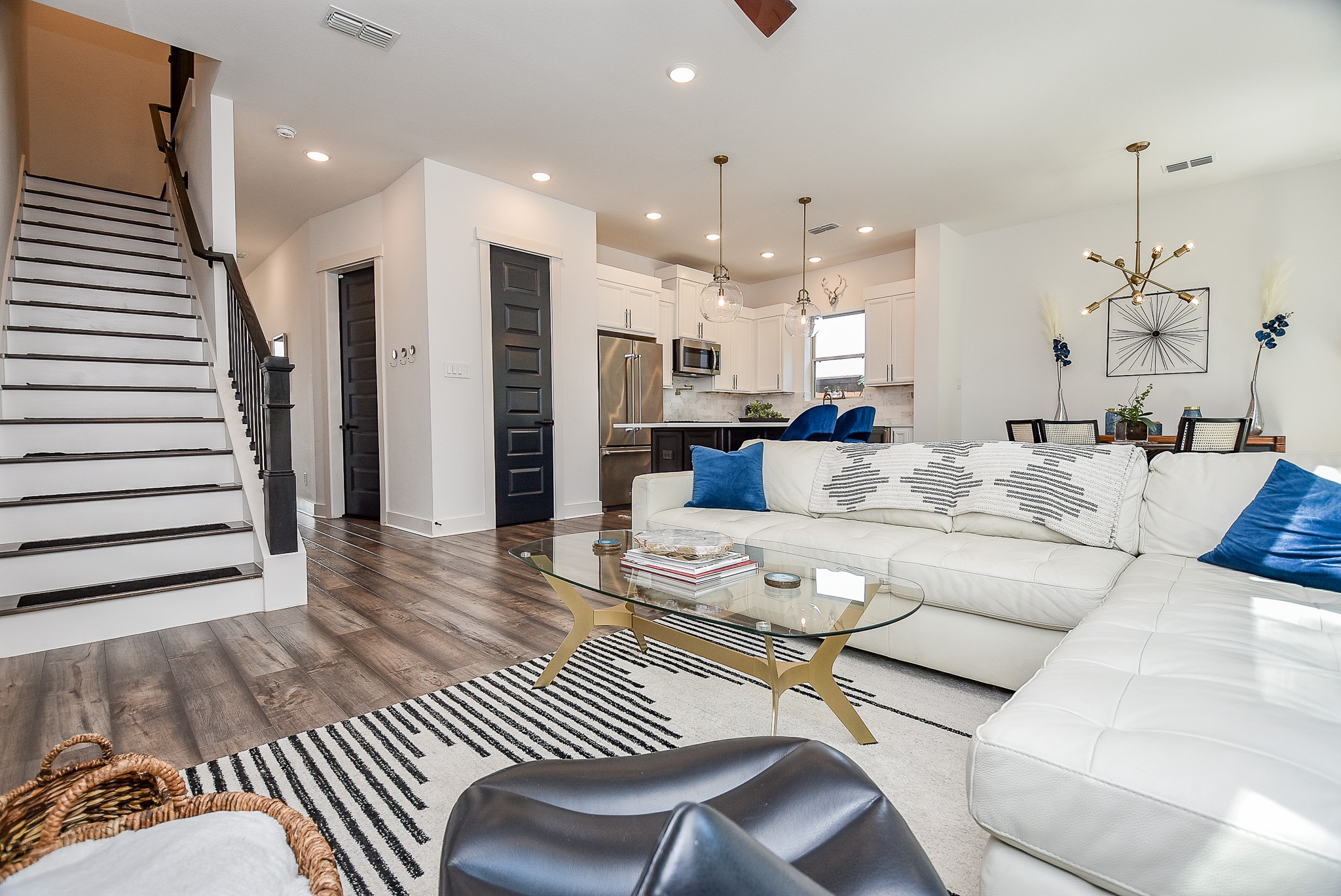 950 Ford Pines Lane Houston, TX 77091 - Photo 12 of 38 Wood stairs with dramatic railing.