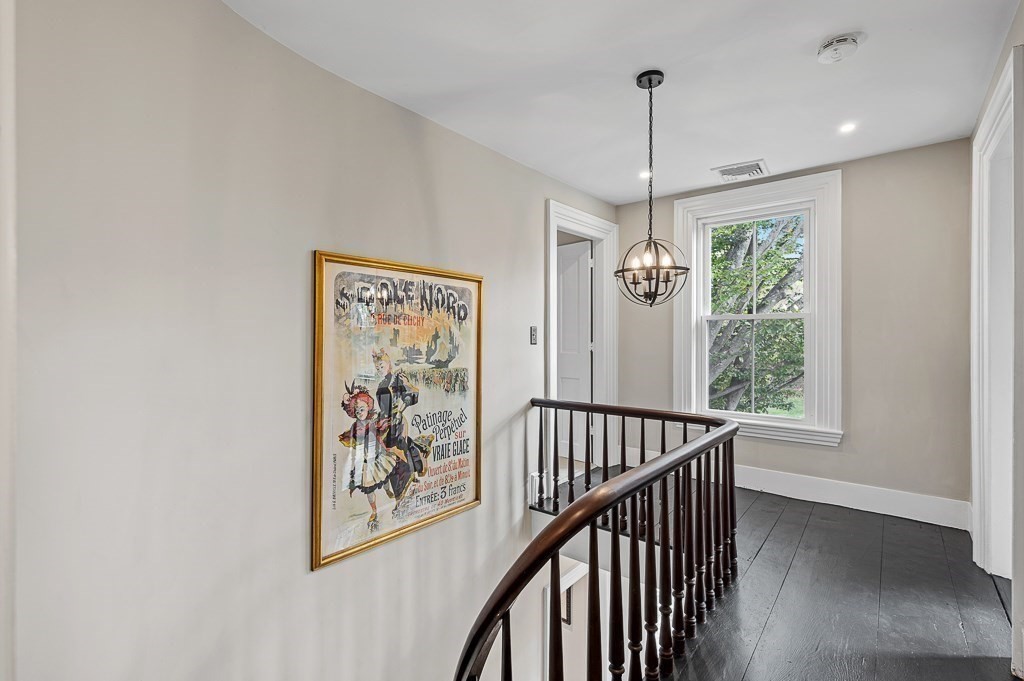 13 Blackstone Street Mendon, MA 01756 - Photo 20 of 41 a view of hallway with windows and chandelier