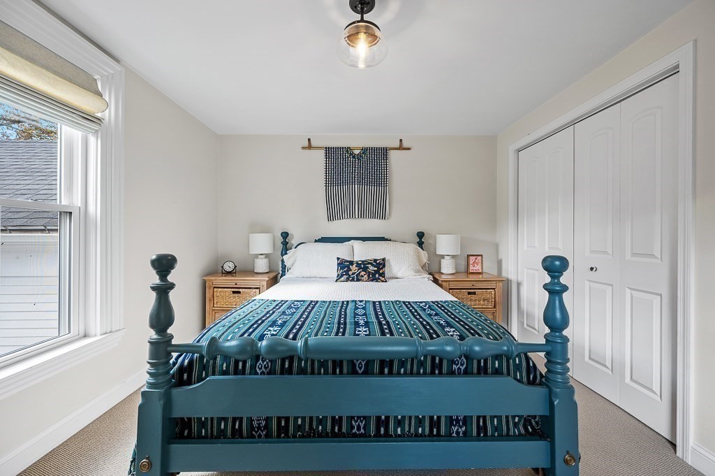 13 Blackstone Street Mendon, MA 01756 - Photo 25 of 41 a bedroom with a bed and window