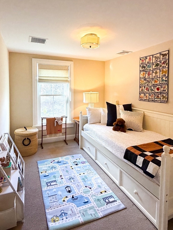 13 Blackstone Street Mendon, MA 01756 - Photo 27 of 41 a bedroom with furniture and a window